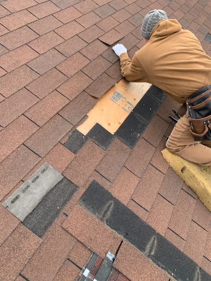 Emergency roofing crew responding to storm damage